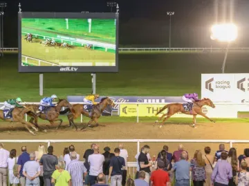 A horse takes a commanding lead during a race at Wolverhampton Races