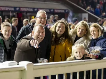 A family enjoying an evening race at Wolverhampton