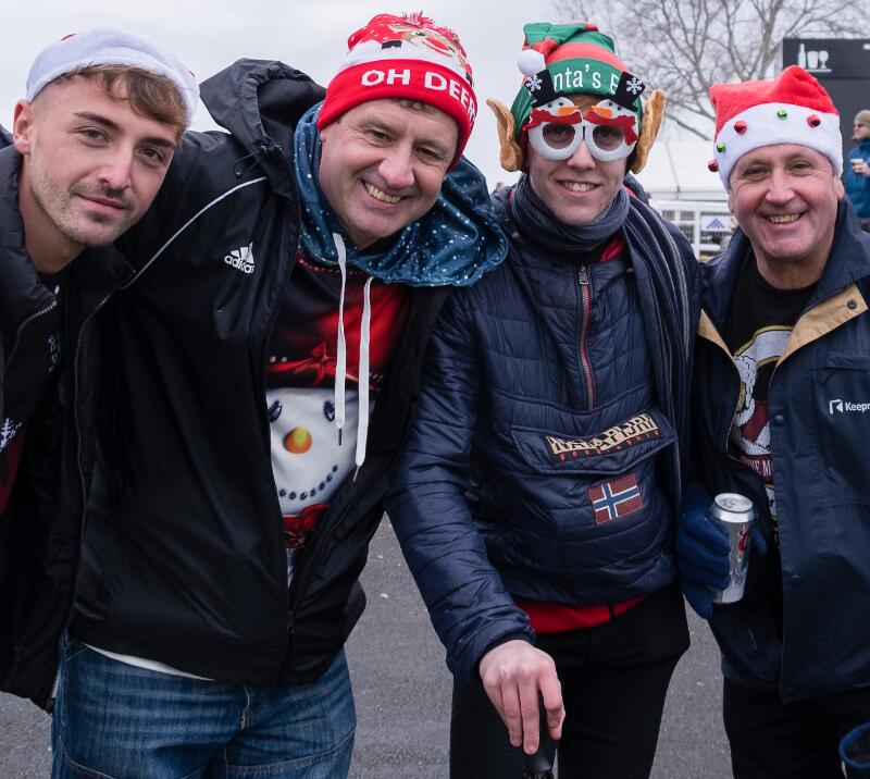 A group of race goers at a festive fixture.