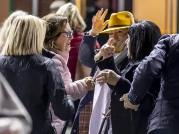 A group of racegoers wrapped up for the weather enjoying Wolverhampton Races