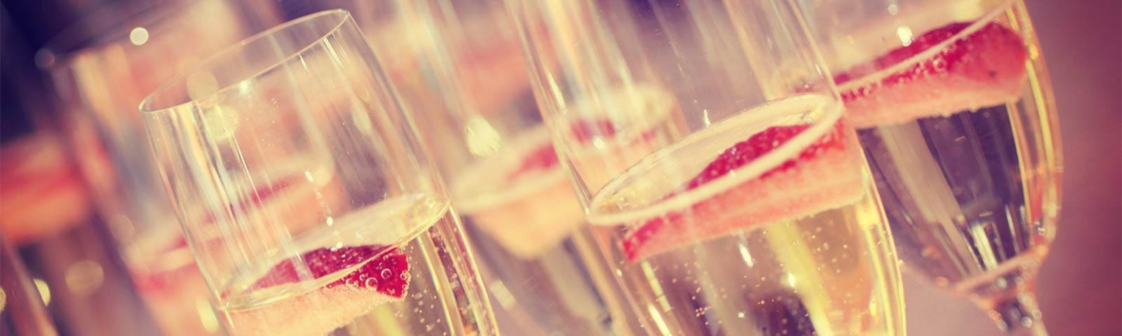 Close up of champagne glasses.