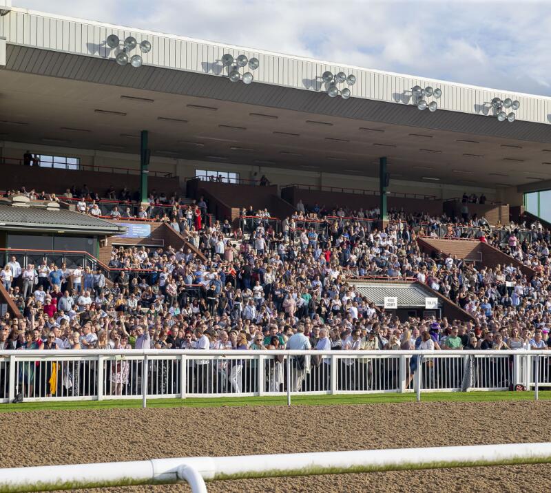 The packed grandstand at Wolverhampton Racecourse
