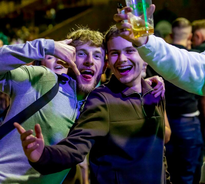 Two young men partying at Wolverhampton Racecourse