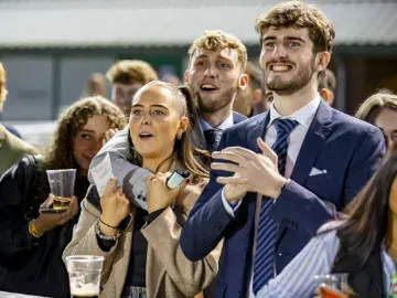 The crowd at Wolverhampton Racecourse watching an exciting race
