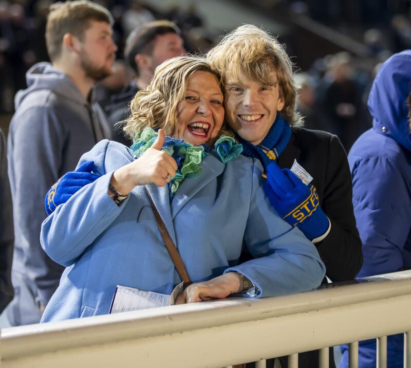 A couple wrapped up against the cold pose for a picture at Wolverhampton Races