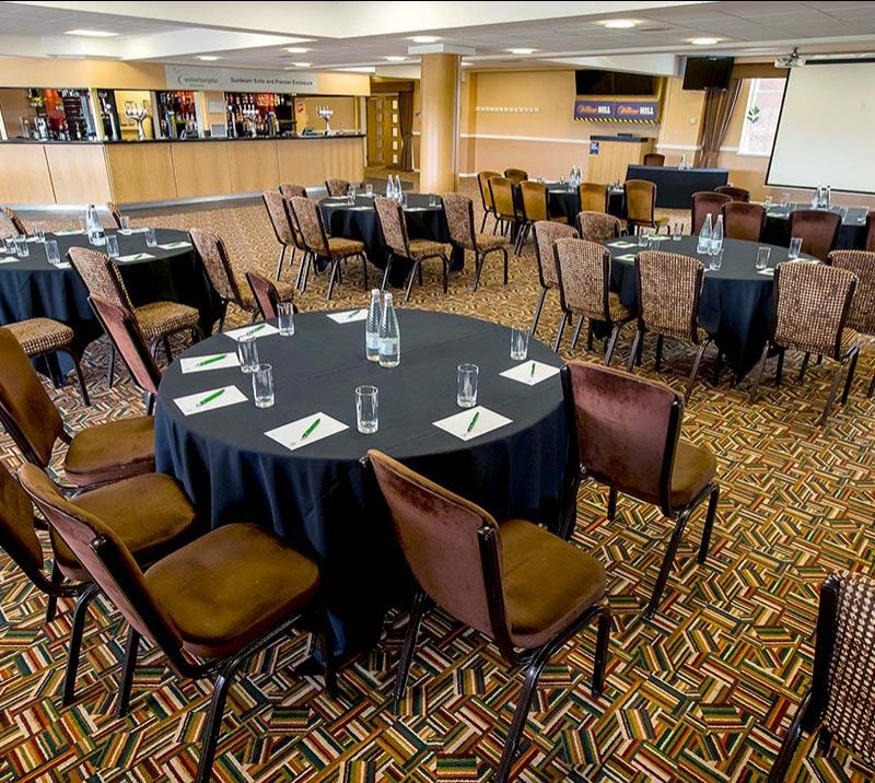 A large meeting room waiting for guests.