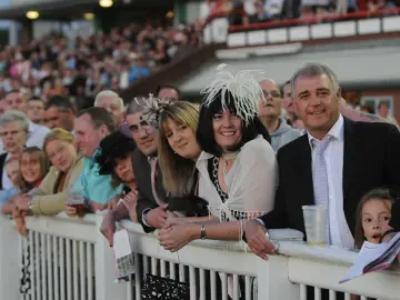 The crowd at Wolverhampton Racecourse watching from the trackside